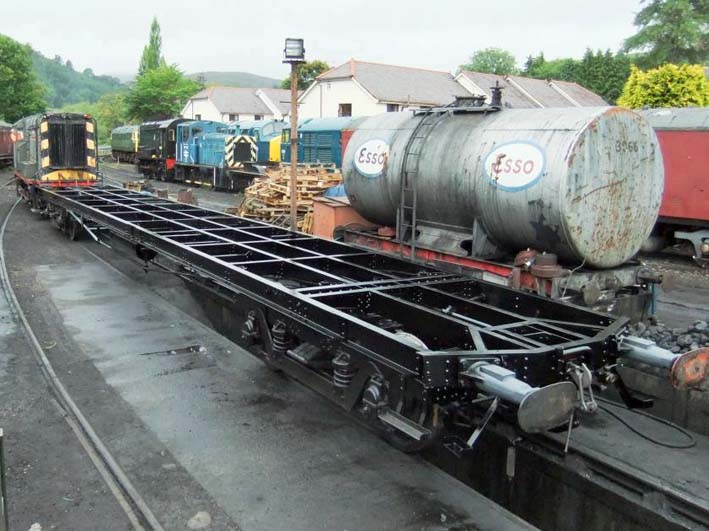 Trailer No 92's underframe is moved from Llangollen's Loco Works