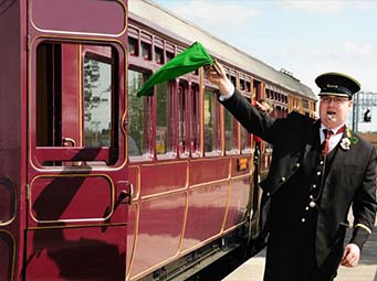 Railmotor No.93 and Trailer No.92 given the right-away by impeccably dressed guard - Matt Baker